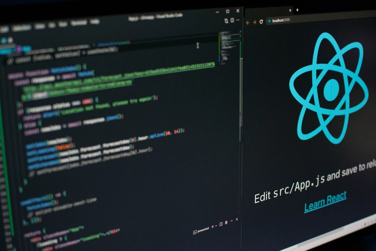 Computer monitor shows code editor.